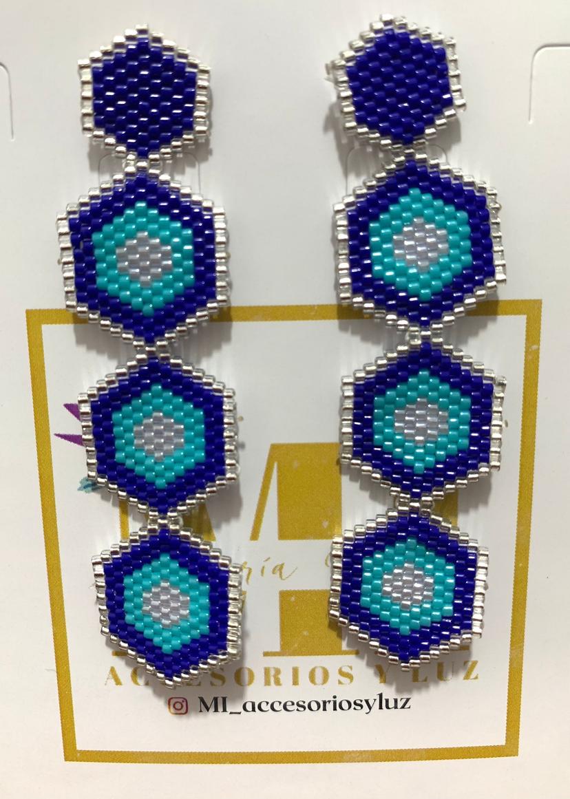 Aretes bolitas azules
